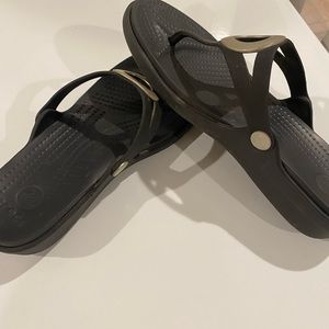Crocs. Flip flops size 9. Black